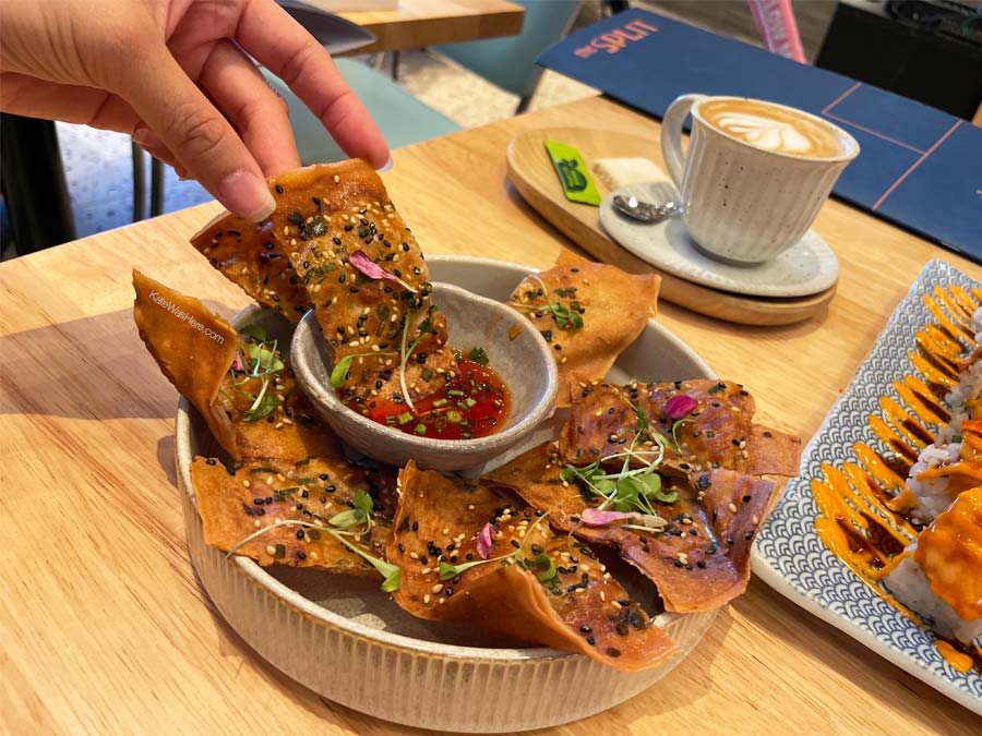 Sesame crackers with sushi and coffee at The Split table